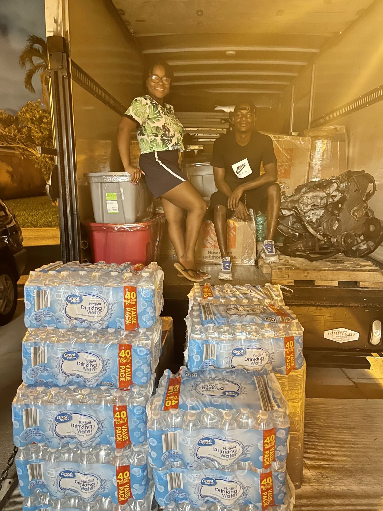 Melissa Lucien packs donation